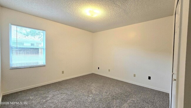 Building Photo - 8636 Charlesgate Cir N