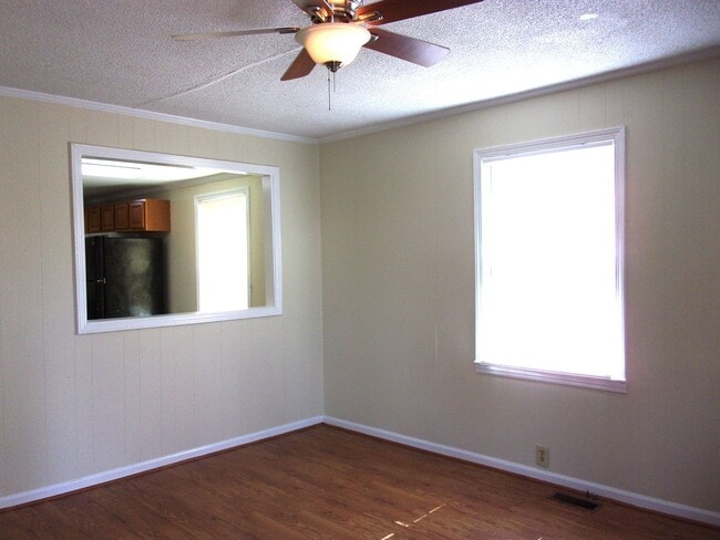 Building Photo - Cute House with Large Backyard and Deck