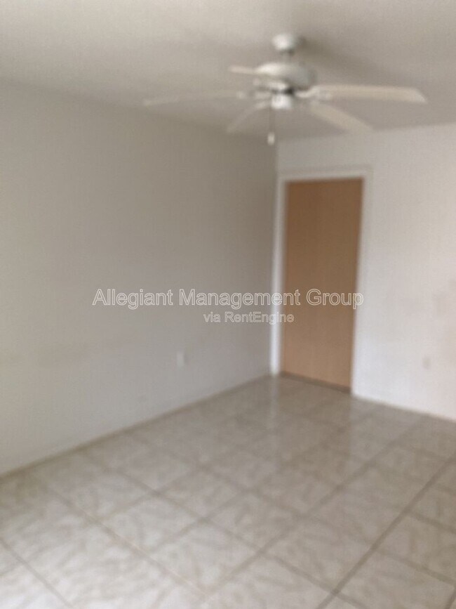 Building Photo - 8722 Rain Forest Pl