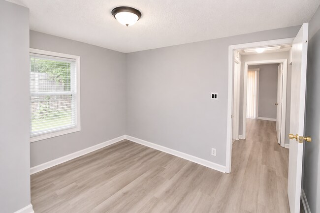 Building Photo - Updated Multi-Bedroom Home | Brand-New Deck | Circular Drive | Triad Premier Realty