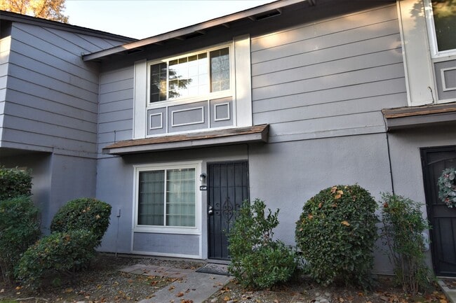 Building Photo - 8744 Woodman Way