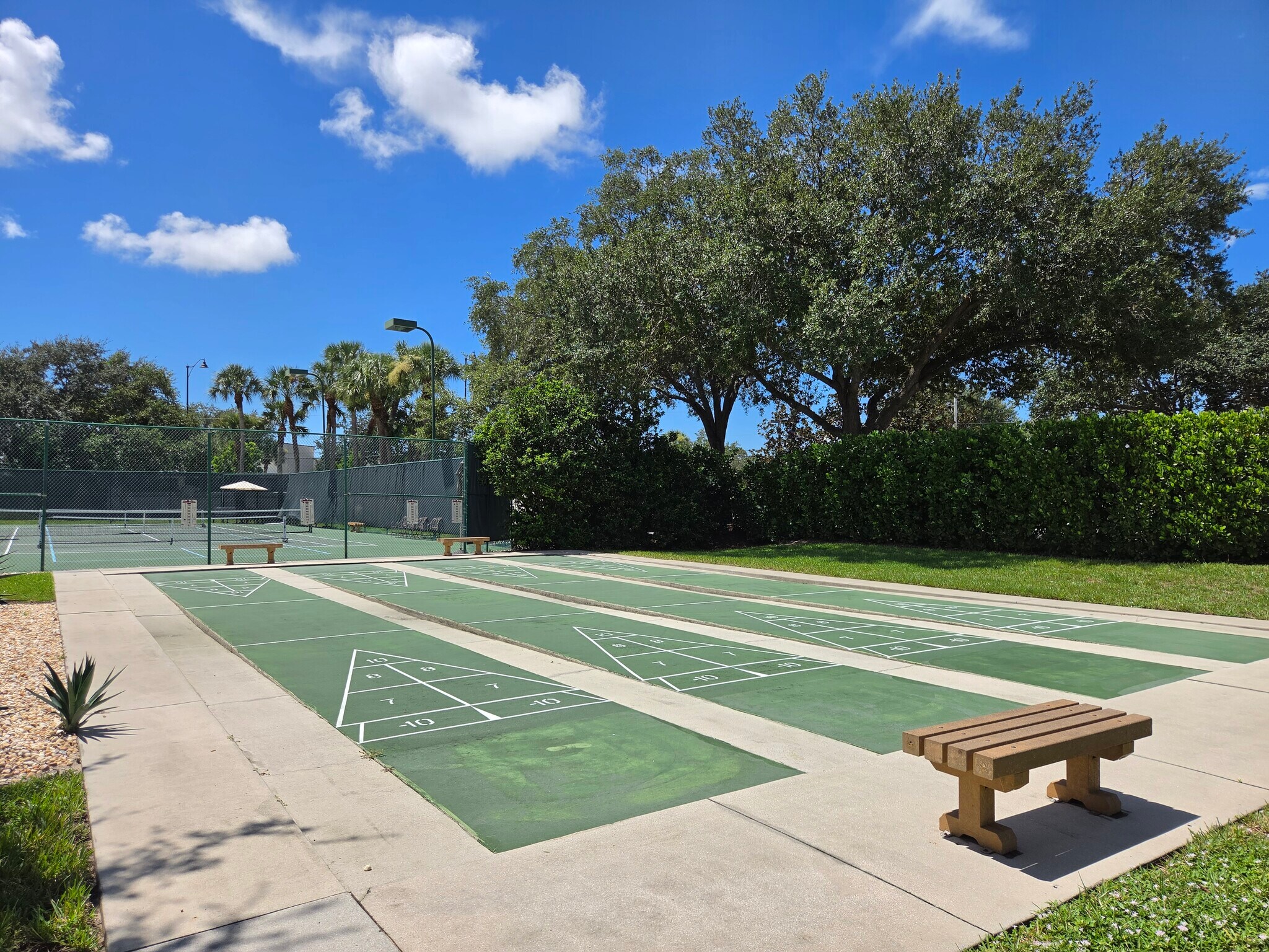 Shuffleboards next to tennis/ pickleball courtd - 25727 Lake Amelia Way
