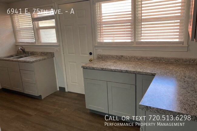 Building Photo - 6941 E 75th Ave