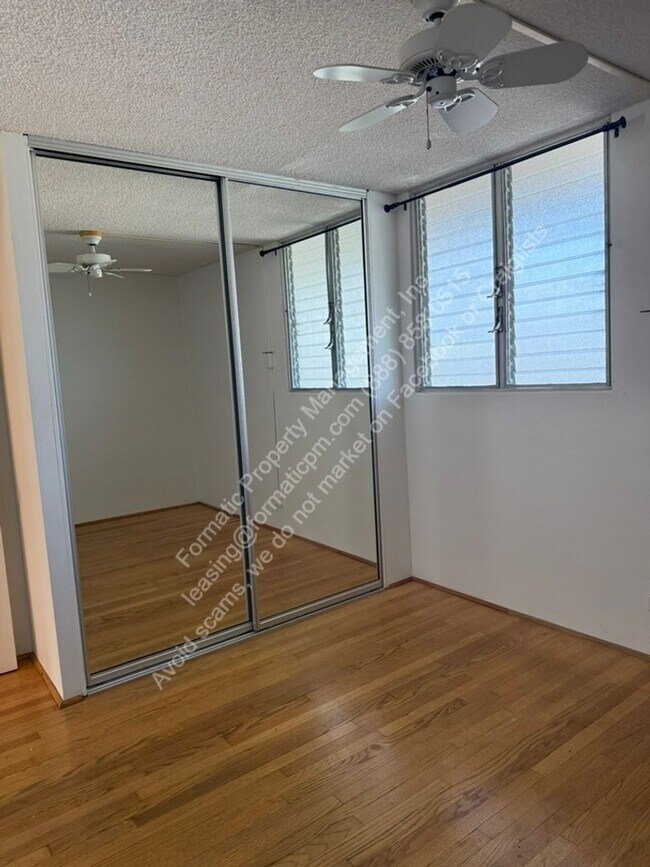 Building Photo - Pet Friendly 2-Bedroom With in Unit Laundry Apartment with Pool & Covered Parking in Honolulu!