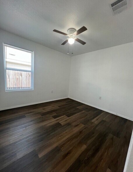 Building Photo - 7002 Cozy Run