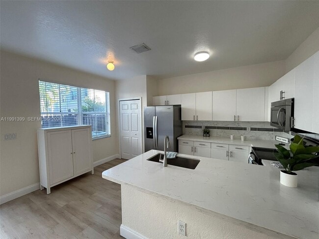 Building Photo - 12515 SW 124th Path