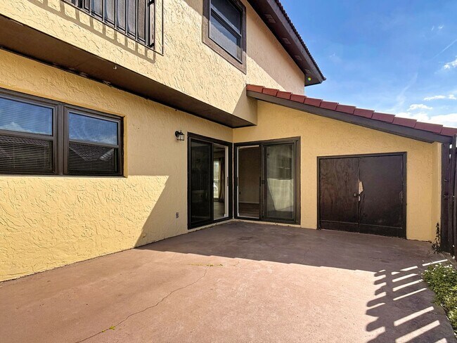 Building Photo - Spanish-Style 3 Bedroom, 2.5 Bath Mediterranean Rooftop Townhouse – Basic Cable & Wi-Fi Included!