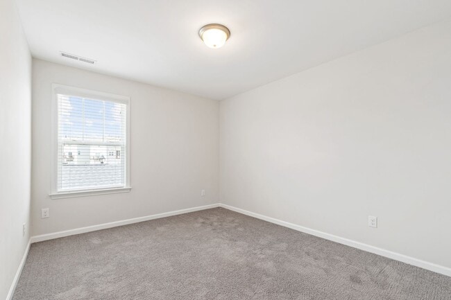 Building Photo - Stylish 4-Bedroom Townhome with Backyard O...