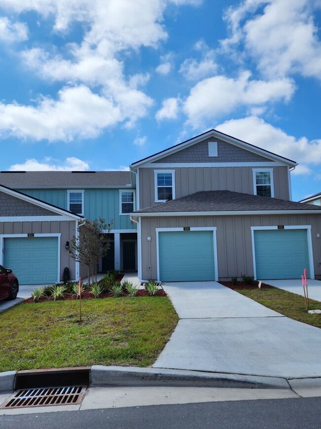Building Photo - ***TWO WEEKS FREE*** New beautiful Three bedroom Two and a half bath two-story townhome