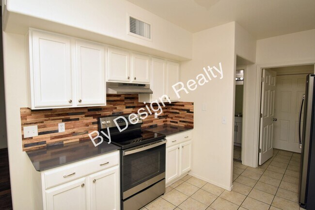 Building Photo - Updated SE Tucson 3BR/2.5BA Gem: Cathedral Ceilings & Private Wash Views