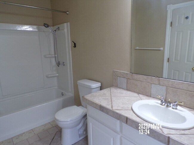 Building Photo - Large bedrooms, located on West side of town