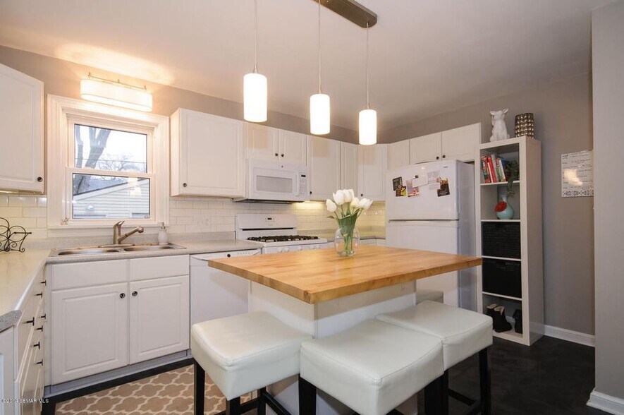 Remodeled kitchen with center island - 728 12th Ave NE