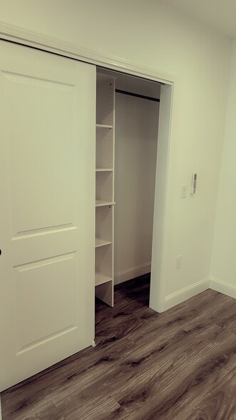 Bedroom closet with shelves - 806 N Ann St
