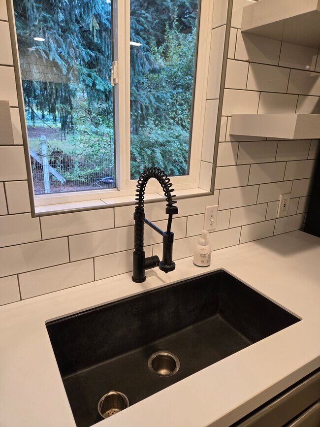 Building Photo - Large lot with tons of storage !  3 br , 2 bth + office+ 2  Car-garage + 2 Wooden Sheds