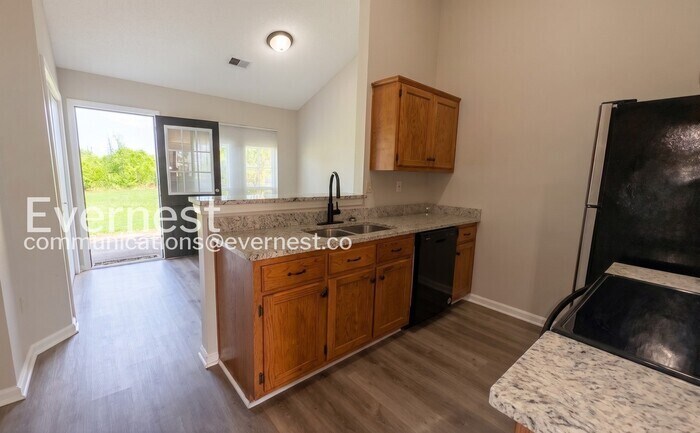 Building Photo - 5669 Kaitlyn Dr W