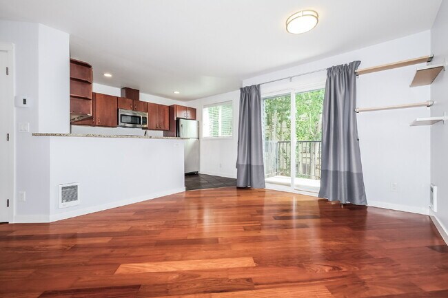 Building Photo - **Updated 2-Bedroom Condo with Secure Parking, In-Unit Laundry & Utilities Included**