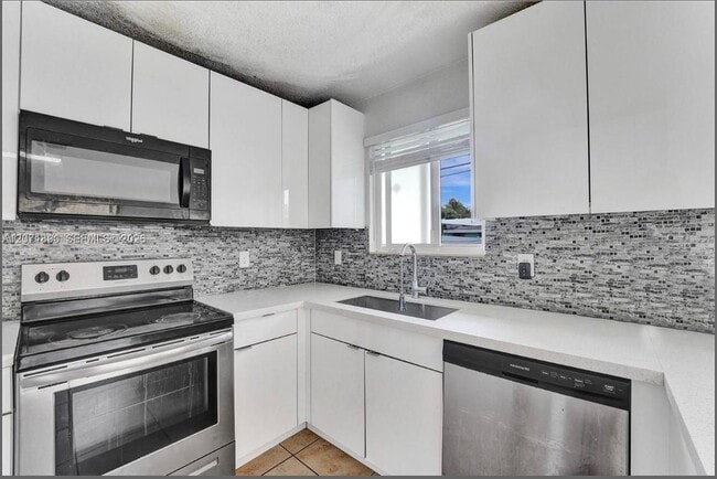 Building Photo - 1154 NW 103rd St