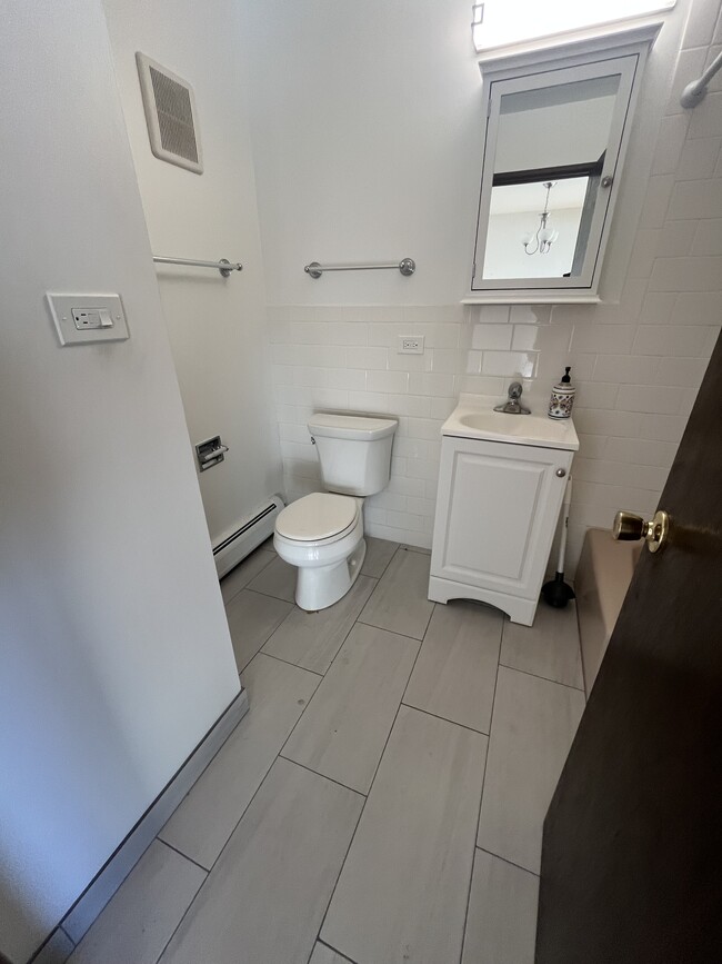 Updated bathroom - 9202 Seymour Ave