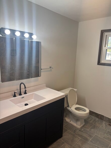 Upstairs bathroom - 302 W State St