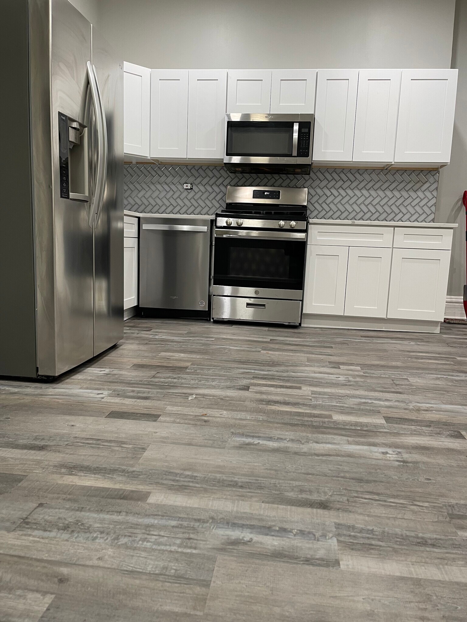Open concept kitchen and living area - 2704 W Adams St
