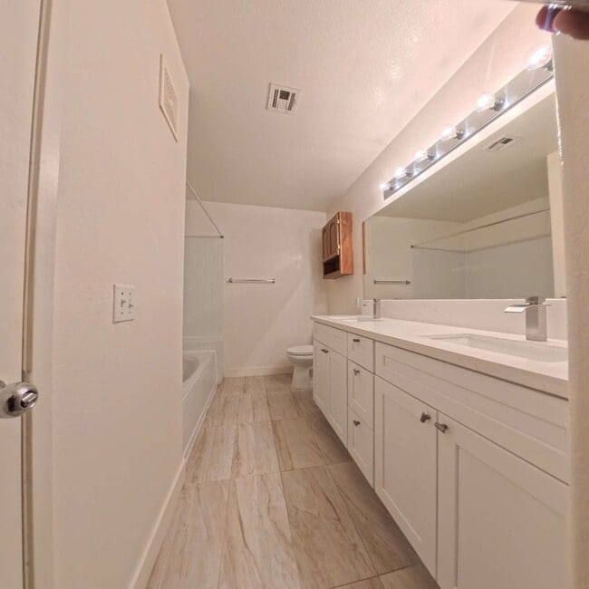Building Photo - Upgraded 1 Bed 1 Bath Second-Story Condo at Opulence!