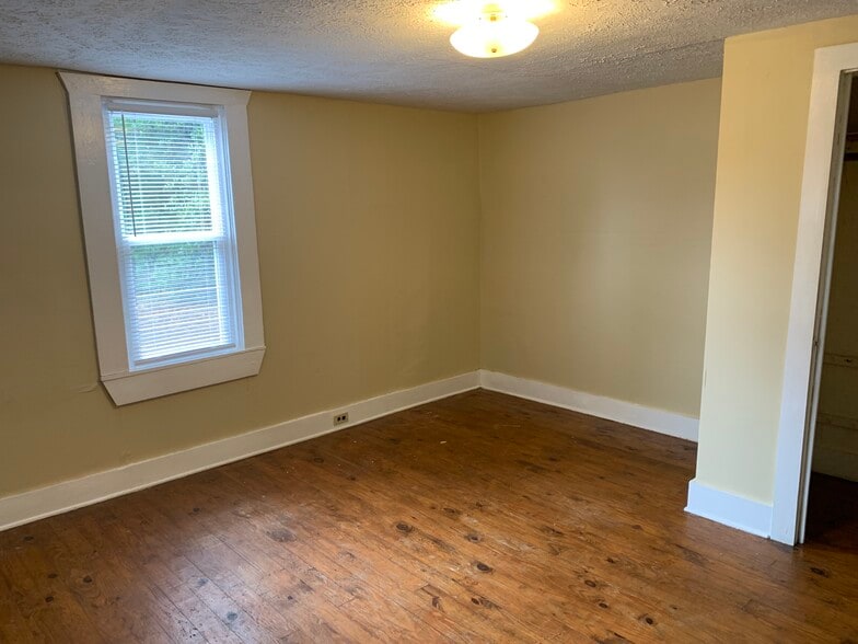 Larger bedroom - 109 1/2 Tuggle Street