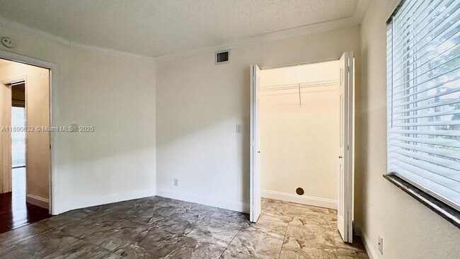Building Photo - 303 Gardens Dr