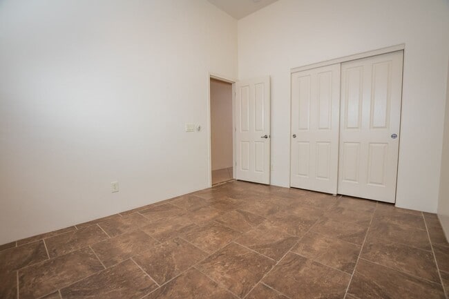 Building Photo - Gorgeous 3 Bedroom 2 Bathroom Home with Tile Throughout! Central A/C, 2 Car Garage!