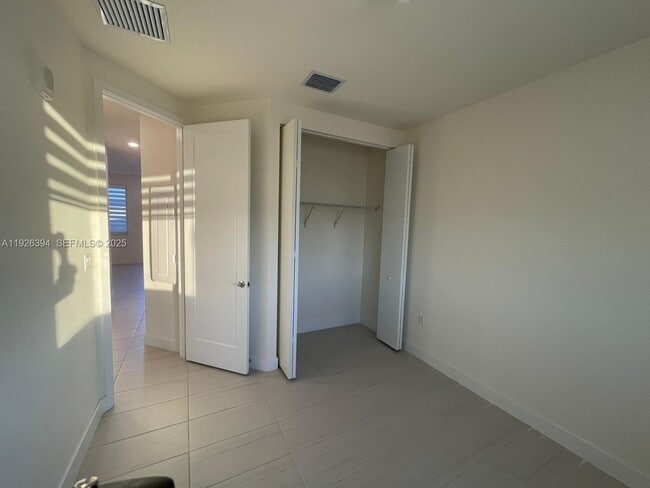 Building Photo - 6416 NW 102nd Ct