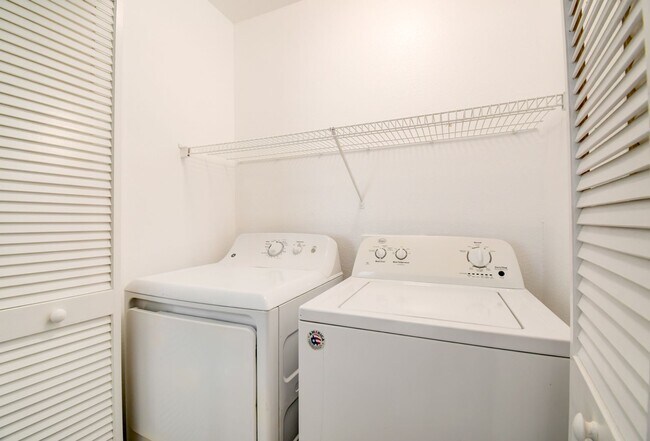 Building Photo - Great home with 4 bedrooms, 2.5 baths. New Floors Paint and Countertops.