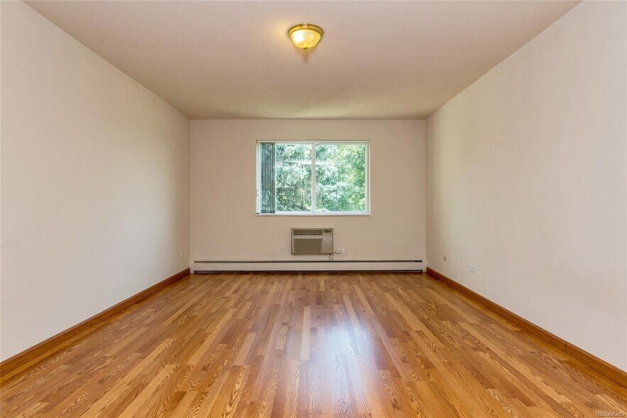 Building Photo - 9340 E Center Ave