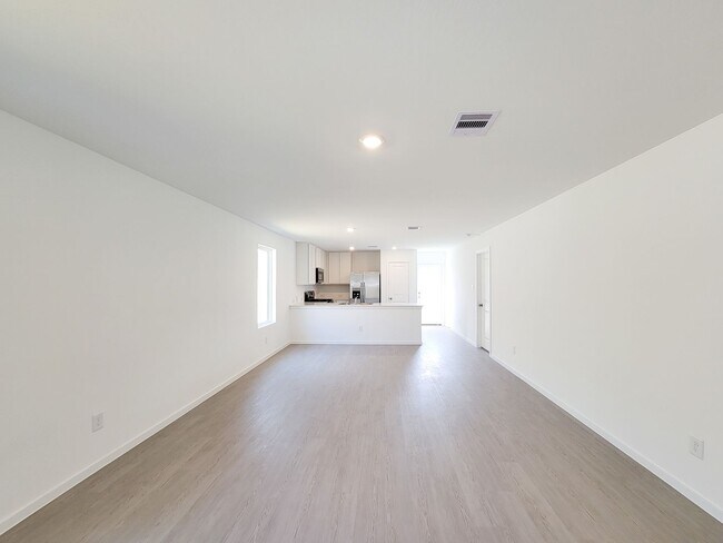 Building Photo - This single-story home shares an open layout between the kitchen, nook and family room for easy e...