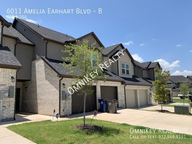 Building Photo - 6011 Amelia Earhart Blvd