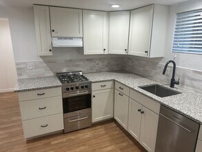 Building Photo - Wonderful updated basement apartment - Available 4/10/26