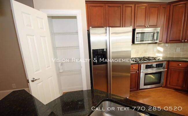 Building Photo - 829 Clifton Heights Ln.- Luxury Townhome