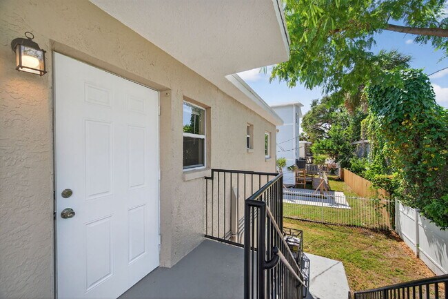 Building Photo - Spacious 2 bed apartment with fenced courtyard, parking, payment plans available for security dep...