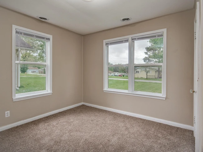 Front bedroom - now has woodgrain vinyl plank flooring - 2708 N Fremont Ave