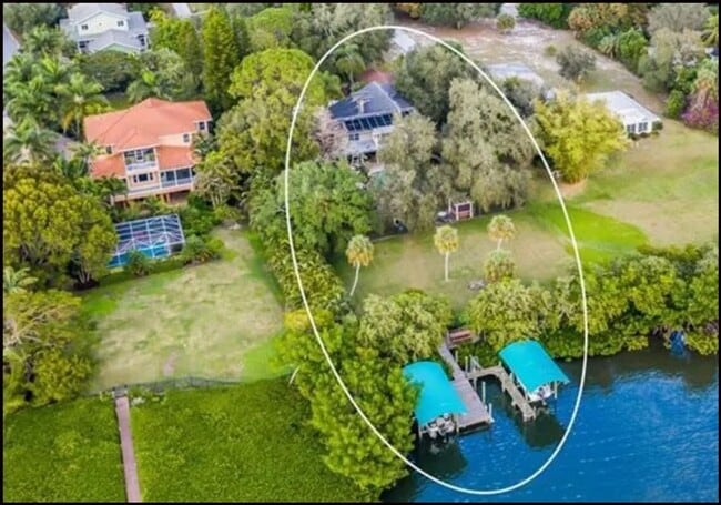 Building Photo - Furnished home on Palma Sola Bay with dock and pool