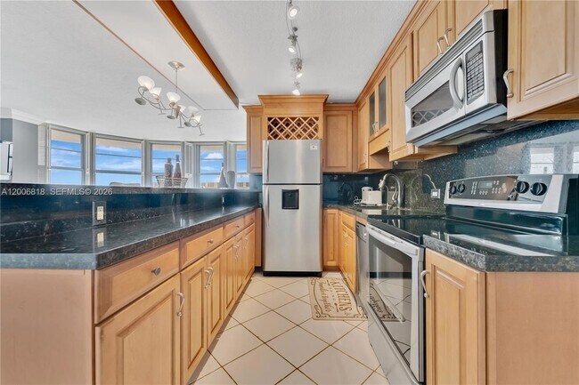 Building Photo - 5555 Collins Ave