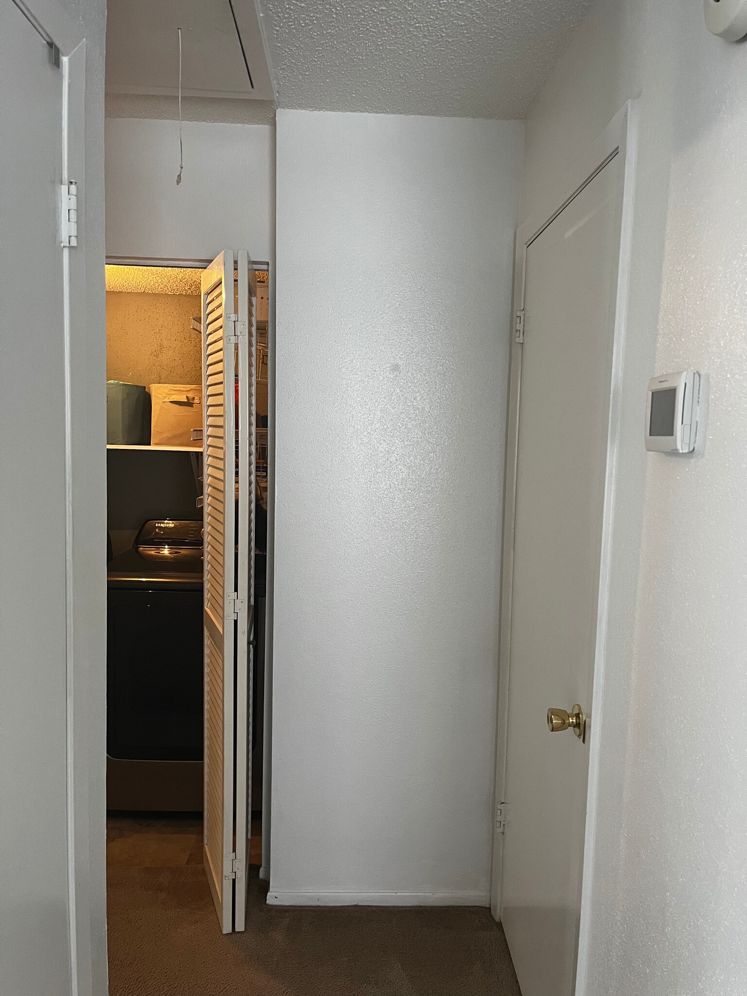 Hallway to washer & dryer - 13632 Garden Grove Ct