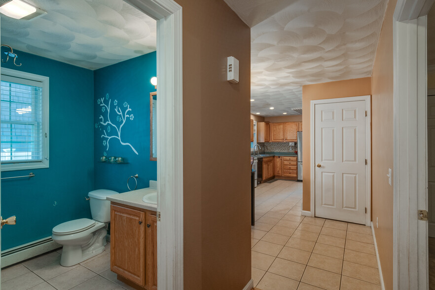 Bathroom on left Dining room and Kitchen on right - Main Level - 101 Allston Street