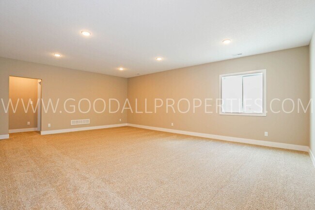 Building Photo - 4-Bedroom Ranch Home in Clive with Finished Basement & 3-Car Garage