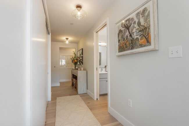 Bedrooms are perfectly located across the condo from the living areas. - 383 Commercial St