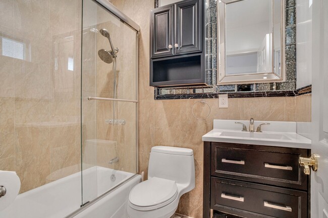 Building Photo - Stunning Remodeled Corner-Lot Home – An En...