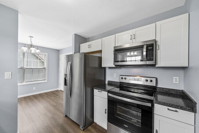 Building Photo - Pet Friendly Three Bedroom with Basement!