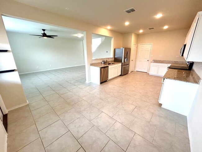 Building Photo - *COMING SOON* Sophisticated Two-Story Home with Versatile Loft Space!