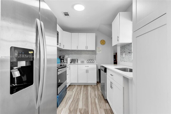 Building Photo - 7681 Sheridan St