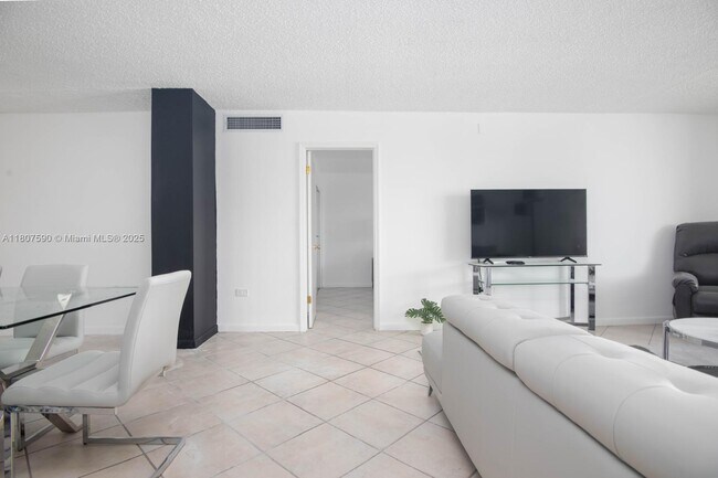 Building Photo - 5555 Collins Ave