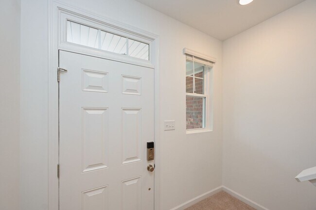 Building Photo - **BE THE LUCKY ONE TO LIVE IN THIS 2024-BUILT BRICK TOWNHOME IN THE VILLAS AT REGAL SQUARE FEATUR...