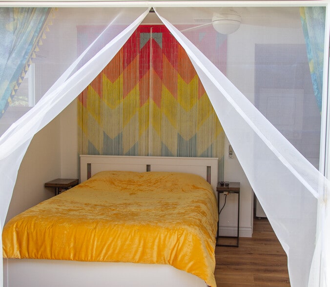 A queen size firm bed with a memory foam topper. Drift off into dream land. - 2150 Euclid Ave
